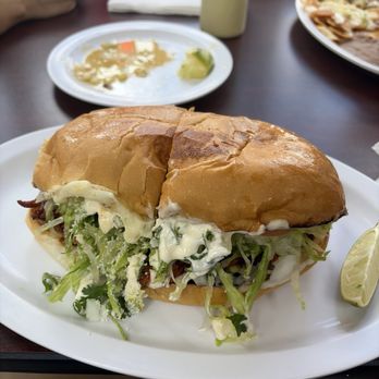 Tita's Cafe - Torta de pastor - Mexican Near Me - Houston, Texas Tita's Cafe - Torta de pastor - Mexican Near Me - Houston, Texas