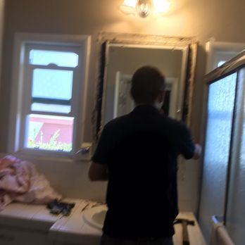 Wang the Handyman 王師傅 - Working on taking out the old medicine cabinet. - Plumbing Near Me Wang the Handyman 王師傅 - Working on taking out the old medicine cabinet. - Plumbing Near Me