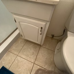 They reattached the vanity, got a new stopper and hooked everything back up.  Marvelous!
