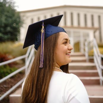 Sather - graduation photo of woman with her cap - Session Photography Near Me
