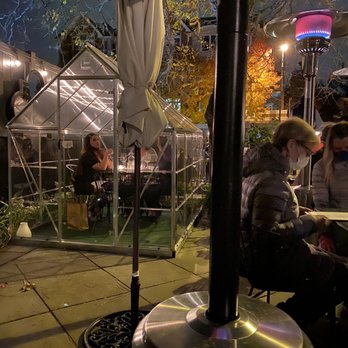501 Local - Lots of heaters on patio and this one greenhouse - New American Near Me - Winnetka, Illinois