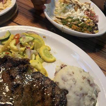 Miller's Ale House - 12 oz Ribeye Steak  Mash potatoes  Vegetable medley - Sports Bars Near Me - Annapolis, Maryland