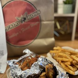 Buffalo Boss Brooklyn’s Finest Wings - Traditional bone-in wings in original hot and lemon pepper with fries.