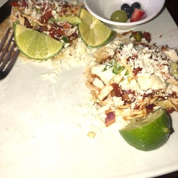 Jelly Cafe - This half eaten Fish taco is a very healthy food option and came in circle with some sauceful of fresh fruits. - Cafes Near Me - Mount Prospect, Illinois