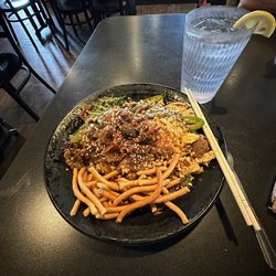 HuHot Mongolian Grill - Beef peppers onions jalapeños honey sriracha garlic chili sauce among other things