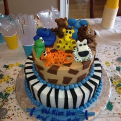 Milca's Gourmet - 3D baby shower cake with zoo animals! Moist chocolate cake with caramel frosting! customer favorite!