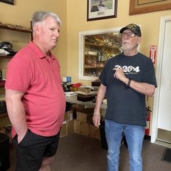 Sticks Cigar Shop - New owner taking to customer