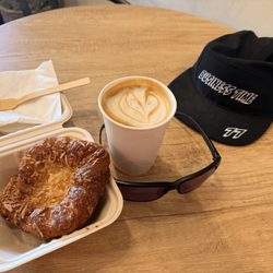 Habibi Motor Cafe - Just a little treat. Spanish latte and coconut pineapple danish.