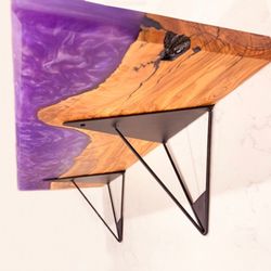 Olive wood and purple epoxy shelf installed in a Long Beach hair salon