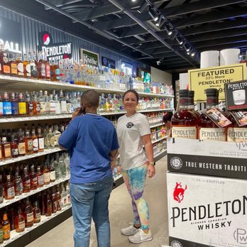Black Rose Liquor - two people in a store - Beer, Wine & Spirits Near Me - Gresham, Oregon
