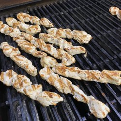 Olympia Restaurant - Chicken Souvlaki, marinated and grilled to perfection