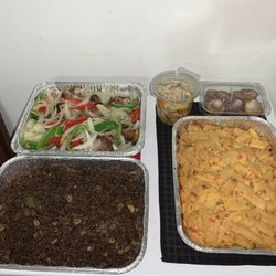 Specially Made - Griot (fried pork), Diri Djon Djon (Haitian mushroom rice), baked macaroni and cheese, fried green plantains, Haitian pikliz (peppers)