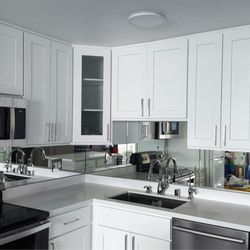 Berkeley Glass Center - Mirrored kitchen backsplash!