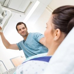 Intermountain Medical Imaging - Doctor scanning patient