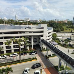 Kidney & Hypertension Specialists of Miami MD - View from patient room of the parking garage and bridge.