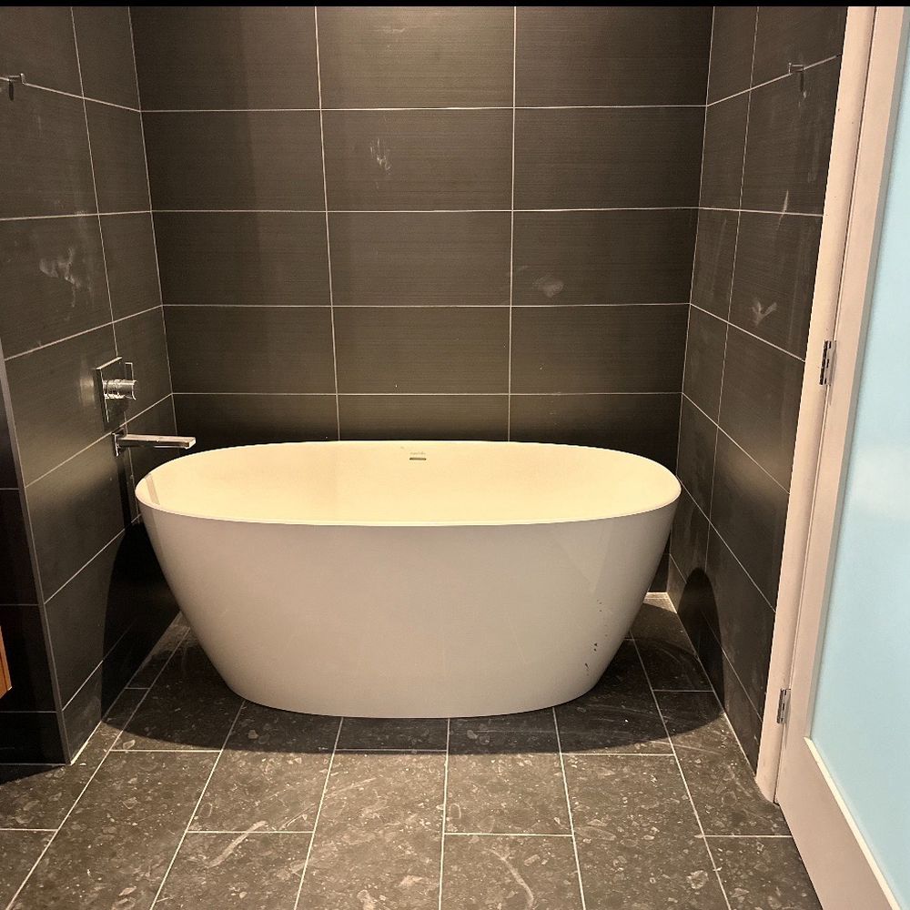 Beautiful work! The tub and tile detail turned my bathroom into a spa-like retreat. Professional and easy to work with--highly recommend!