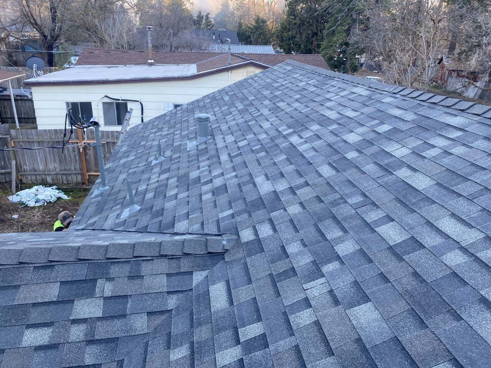 Slide of F M Quality Roofing