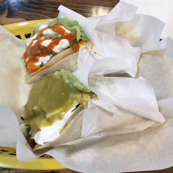 La Taqueria - Red sauce taco is the lengua taco and the green sauce taco is the al pastor taco. I added sour cream, cheese and avocado. - Mexican Near Me - Turlock, California La Taqueria - Red sauce taco is the lengua taco and the green sauce taco is the al pastor taco. I added sour cream, cheese and avocado. - Mexican Near Me - Turlock, California