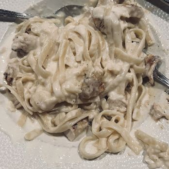 Divieto Ristorante - Estero - Fettuccine Alfredo with Chicken tossed in the wheel. It is the first dish on the menu. - Italian Near Me - Estero, Florida Divieto Ristorante - Estero - Fettuccine Alfredo with Chicken tossed in the wheel. It is the first dish on the menu. - Italian Near Me - Estero, Florida