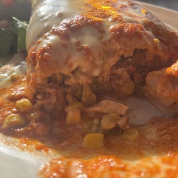 Elmyriachi - Crosscut pic of the Chicken Chimichanga - Mexican Near Me - Atlanta, Georgia Elmyriachi - Crosscut pic of the Chicken Chimichanga - Mexican Near Me - Atlanta, Georgia