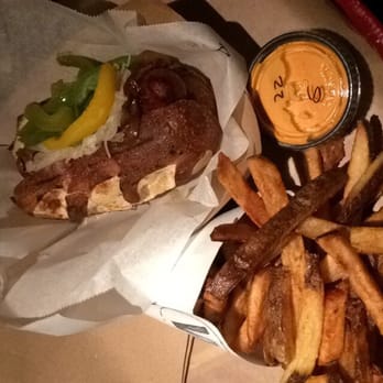 Wursthaus - Spicy polish on pretzel bun. Fries with creamy siracha. Siracha was good, spicy polish was good. No on the pretzel bun! - Pubs Near Me - Santa Ana, California