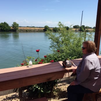 Dinky Diner - Jamie enjoying the river view at the Dinky Diner above the Sacramento River. - Food Trucks Near Me - Clarksburg, California