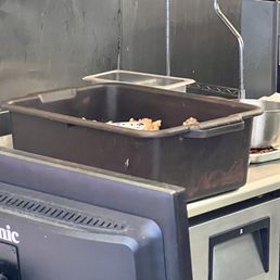 a pan of food on a counter a pan of food on a counter