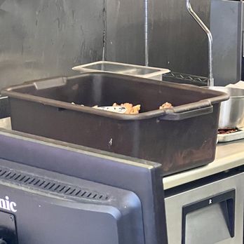 Chang Jiang Chinese Restaurant - a pan of food on a counter - Chinese Near Me - Mount Horeb, Wisconsin Chang Jiang Chinese Restaurant - a pan of food on a counter - Chinese Near Me - Mount Horeb, Wisconsin