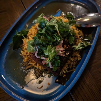 Cira - Tamarind Glazed Brisket (Tunisian basmati, grilled dates, sesame dukkah, herb salad) - Mediterranean Near Me - Chicago, Illinois Cira - Tamarind Glazed Brisket (Tunisian basmati, grilled dates, sesame dukkah, herb salad) - Mediterranean Near Me - Chicago, Illinois
