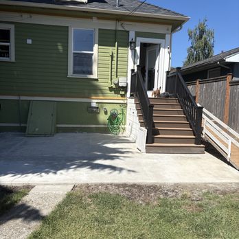 LC Builders - Staircase new cement deck and dog ramp for the dog door - Painters Near Me