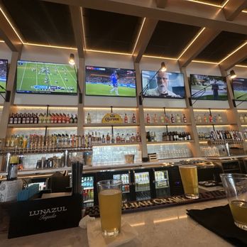 Crush Yard - Bar area with oodles of TVs. - Sports Bars Near Me - Kissimmee, Florida Crush Yard - Bar area with oodles of TVs. - Sports Bars Near Me - Kissimmee, Florida