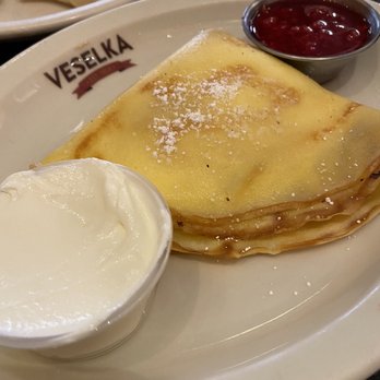 Veselka - Blintz with Raspberry Sauce - Ukrainian Near Me - New York, New York Veselka - Blintz with Raspberry Sauce - Ukrainian Near Me - New York, New York