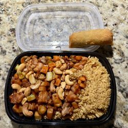 China Wok 2 - C14. Cashew Nuts With Chicken Combo (served with Pork Fried Rice and Egg Roll) as a to-go order.