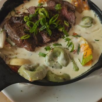 San Chez Bistro - bistec con pimienta (steak with tortellini in manchego cream sauce) - Breakfast & Brunch Near Me - Grand Rapids, Michigan San Chez Bistro - bistec con pimienta (steak with tortellini in manchego cream sauce) - Breakfast & Brunch Near Me - Grand Rapids, Michigan