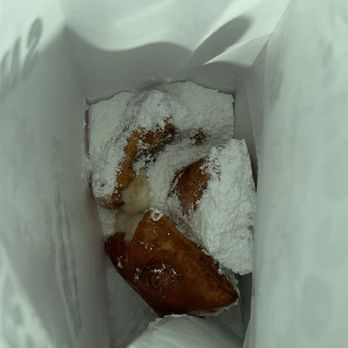 SnoCorner - Beignets filled with Banana Cream Pie flavor and chocolate - Desserts Near Me - Long Beach, California SnoCorner - Beignets filled with Banana Cream Pie flavor and chocolate - Desserts Near Me - Long Beach, California