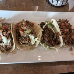 Left to right- 2 carnita street tacos, 1 asada, 1 ground beef