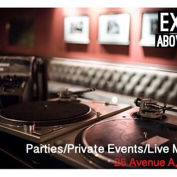2A - a turntable and a record player in a recording studio - Bars Near Me - New York, New York 2A - a turntable and a record player in a recording studio - Bars Near Me - New York, New York