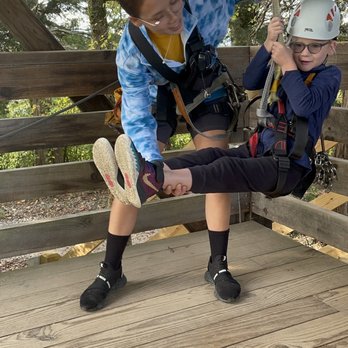 Wahoo Ziplines - Kristie helping out 6yo! - Ziplining Near Me - Sevierville, Tennessee