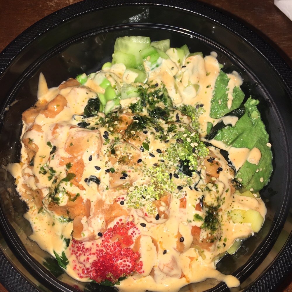 Purple rice, spicy salmon, seaweed salad, edamame, kelp, avocado, mango, cucumber, roe, spicy sauce, furikake and sriracha mayo! Purple rice, spicy salmon, seaweed salad, edamame, kelp, avocado, mango, cucumber, roe, spicy sauce, furikake and sriracha mayo!