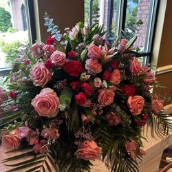 Sunshine Flowers & Gifts - Casket floral arrangement