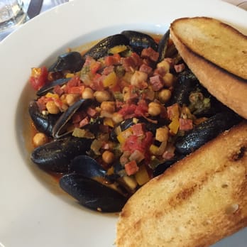 Lola's - Mussels with chorizo and chickpeas. - Spanish Near Me - New Orleans, Louisiana