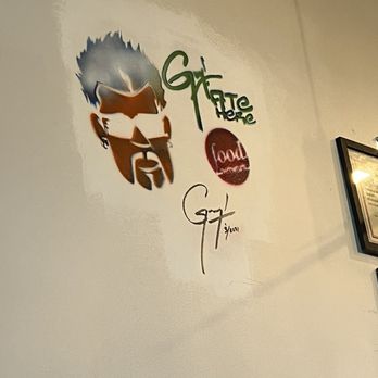 Joey's Kitchen Napili - a man's face on the wall - Filipino Near Me - Lahaina, Hawaii Joey's Kitchen Napili - a man's face on the wall - Filipino Near Me - Lahaina, Hawaii