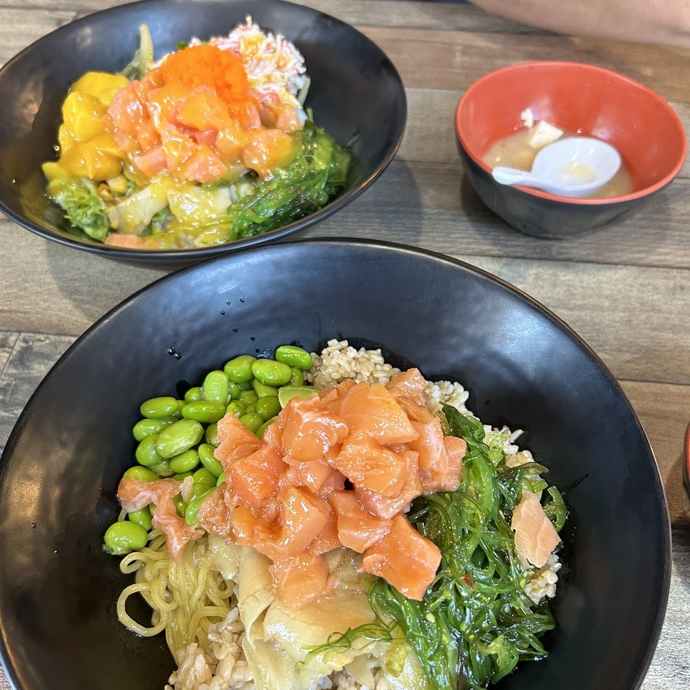 Menya Noodle Bar - Poke Salmon Bowl with mango sauce? (top) and Salmon bowl with Yuzu sauce (bottom) - Ramen Near Me - Denver, Colorado Menya Noodle Bar - Poke Salmon Bowl with mango sauce? (top) and Salmon bowl with Yuzu sauce (bottom) - Ramen Near Me - Denver, Colorado