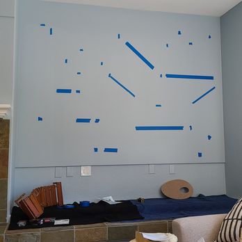 Andy Scales Art Installation - Taped-out cat wall before installing - Art Installation Near Me