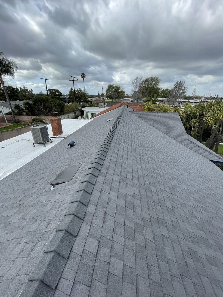 Slide of Baiza's Roofing