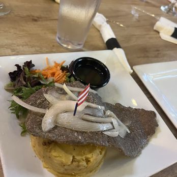 The Mofongo King - Bistec encebollado con mofongo  Mofongo con bistec encebollado - Puerto Rican Near Me - Port St Lucie, Florida