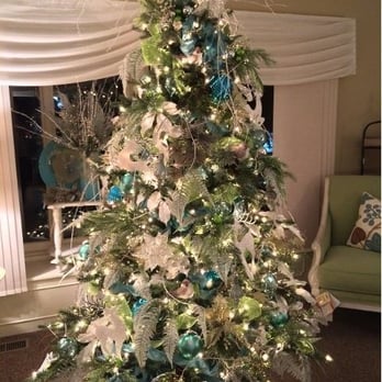 Genoa Custom Interiors - a christmas tree decorated with blue and white ornaments - Carpet Installation Near Me - Genoa, Ohio