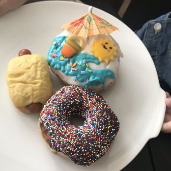 Sugarboy Donuts - Chocolate frosting and sprinkles, small kolache and a specialty Beach donut. - Donuts Near Me - Prosper, Texas