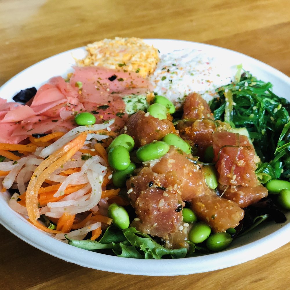 Mixed greens with salmon and spicy tuna with ginger citrus dressing and shoyu dressing plus all the yummy toppings. Mixed greens with salmon and spicy tuna with ginger citrus dressing and shoyu dressing plus all the yummy toppings.