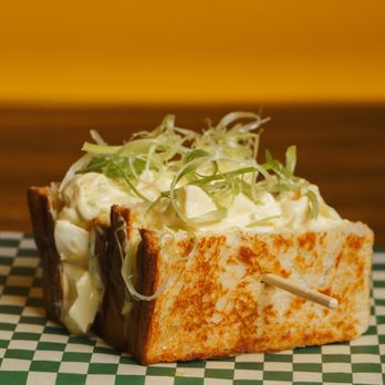 Sando - a grilled cheese sandwich on a checkered tablecloth - Sandwiches Near Me - Miami Beach, Florida Sando - a grilled cheese sandwich on a checkered tablecloth - Sandwiches Near Me - Miami Beach, Florida